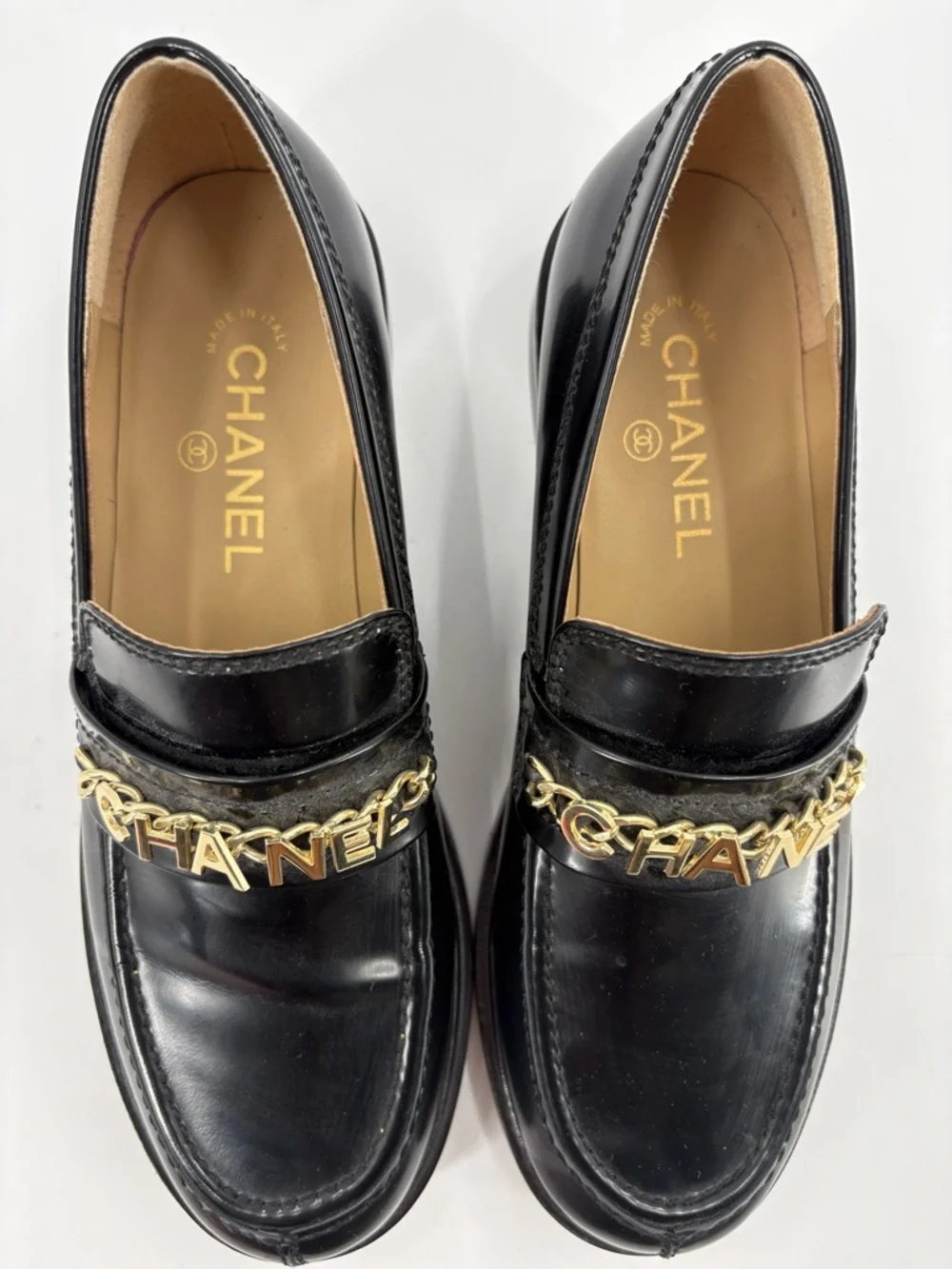 CHANEL Black Leather Loafers with Gold Logo Chain